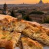 Trastevere e Gianicolo, la pizza bianca romana tra vicoli, pietra e tramonto