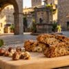 Viterbo medievale e tozzetti alle nocciole: il gusto asciutto della Tuscia